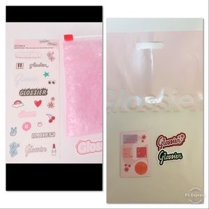 Glossier stickers+ pouch